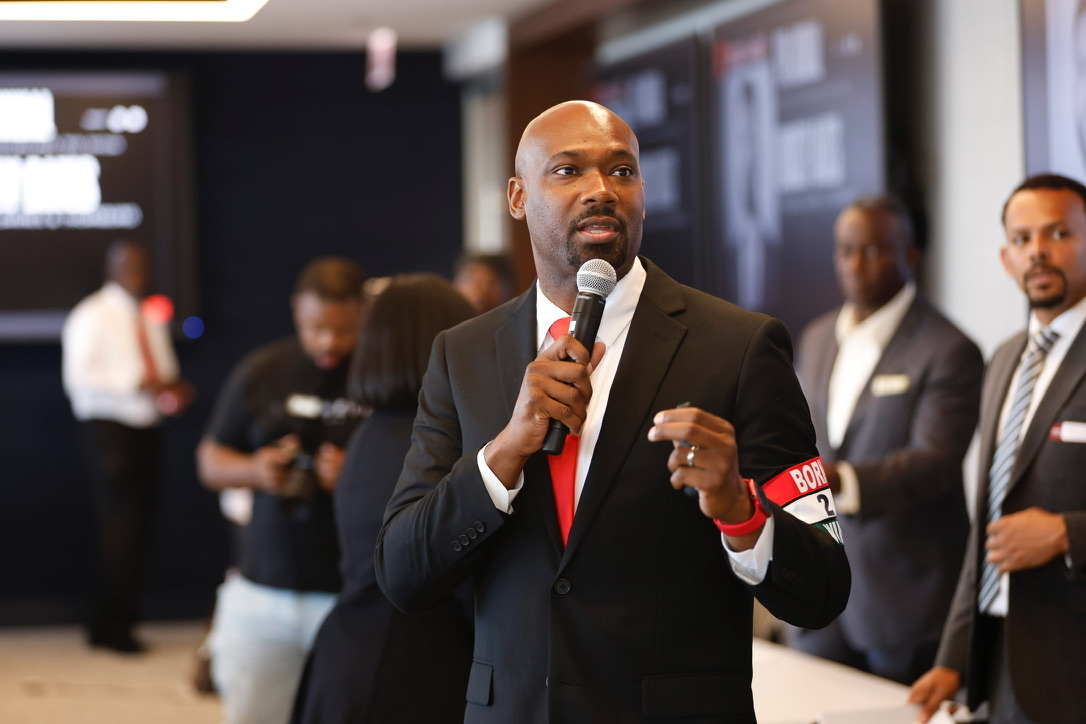 Dr. Vondale E. Singleton Sr. speaking into a microphone